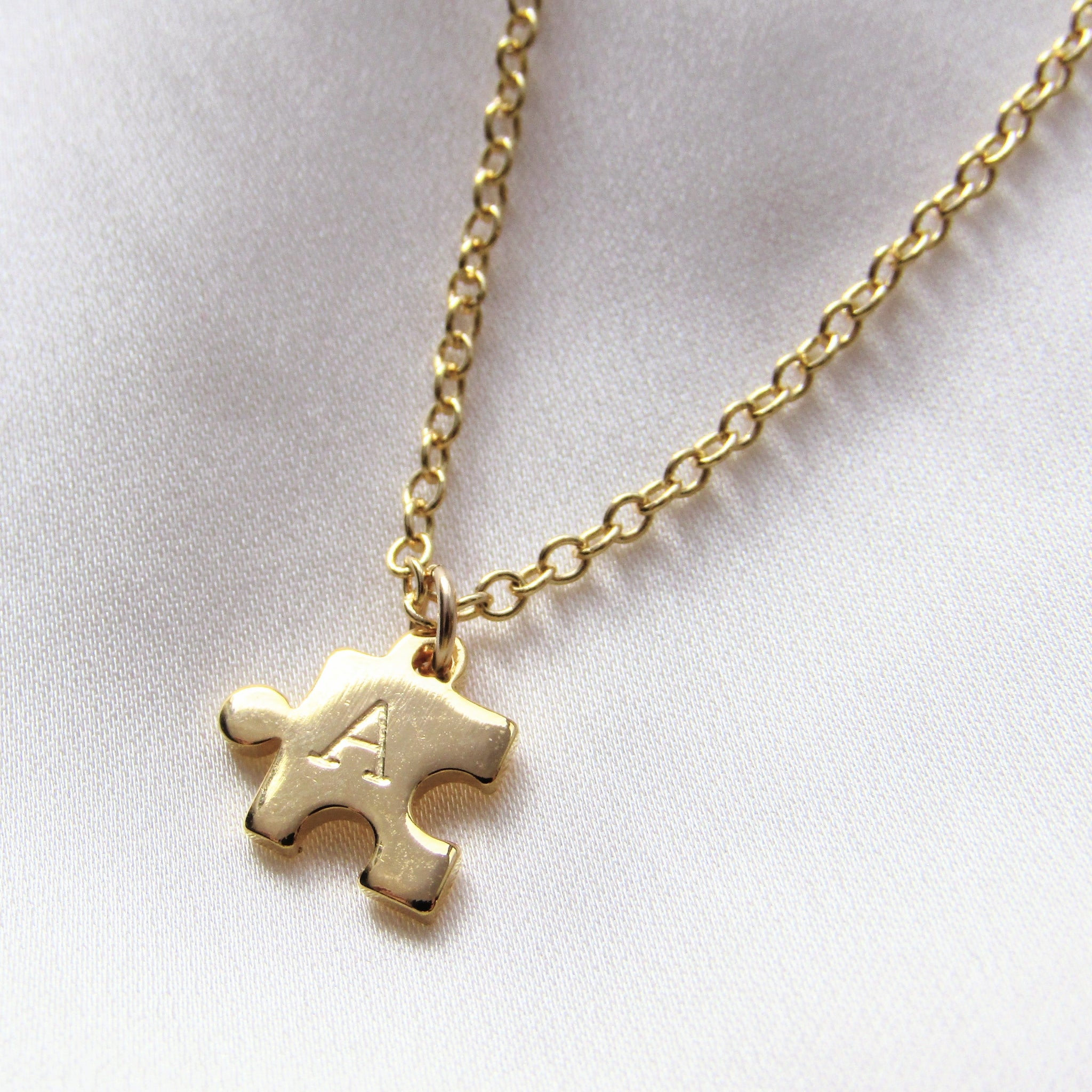 Gold Puzzle Piece Necklace